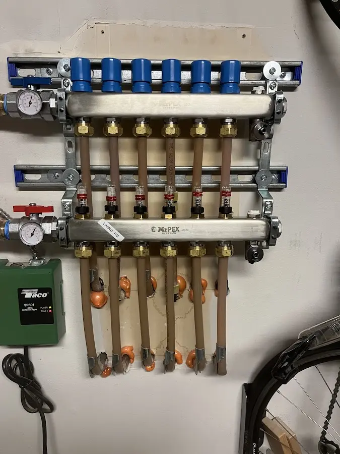 Plumber performing Water Heater Repair at a residential property in Grosse Pointe Woods